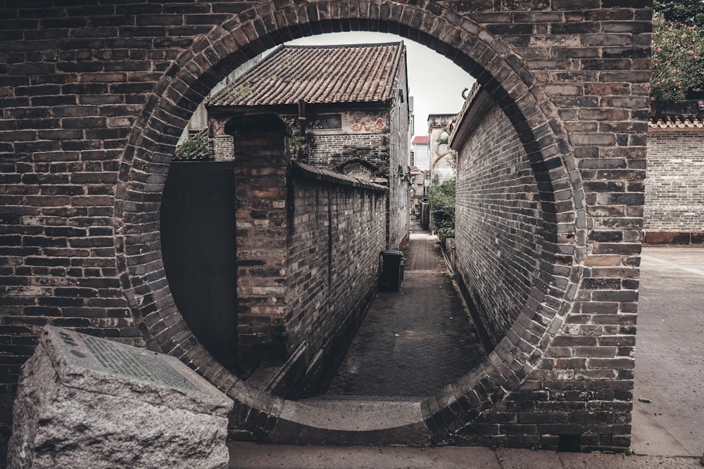 brown brick tunnel during daytime