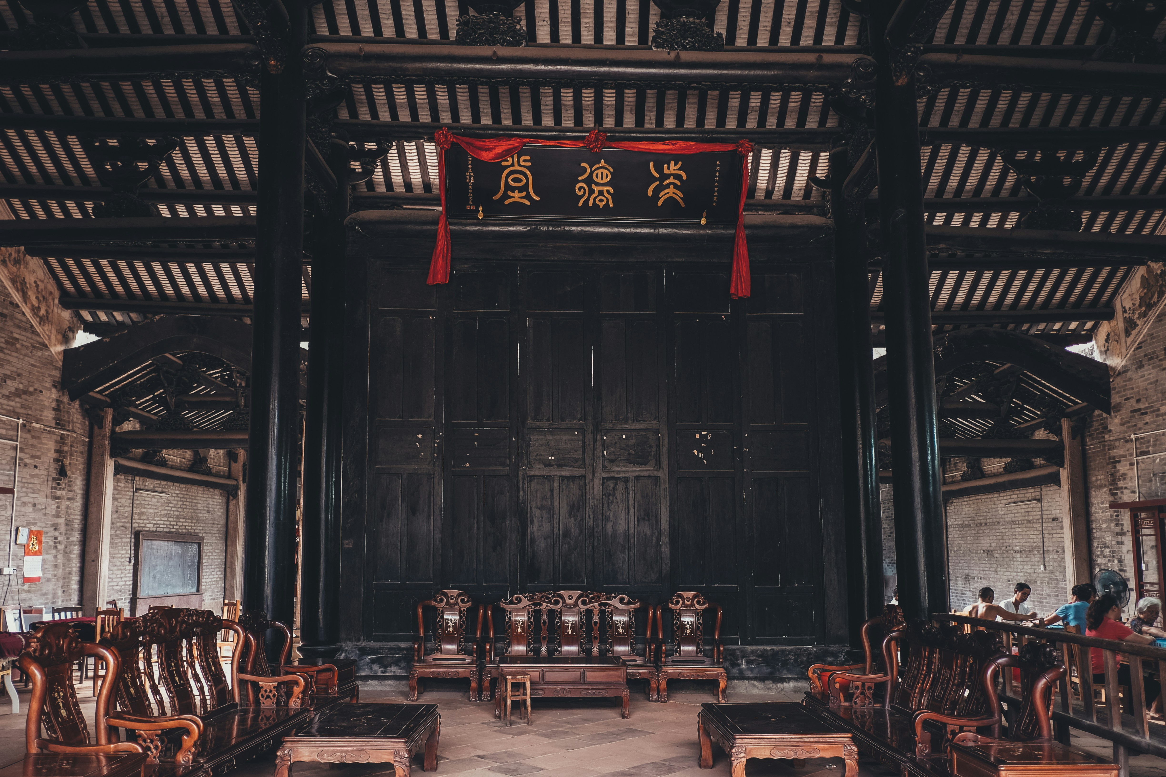 brown wooden chairs and tables