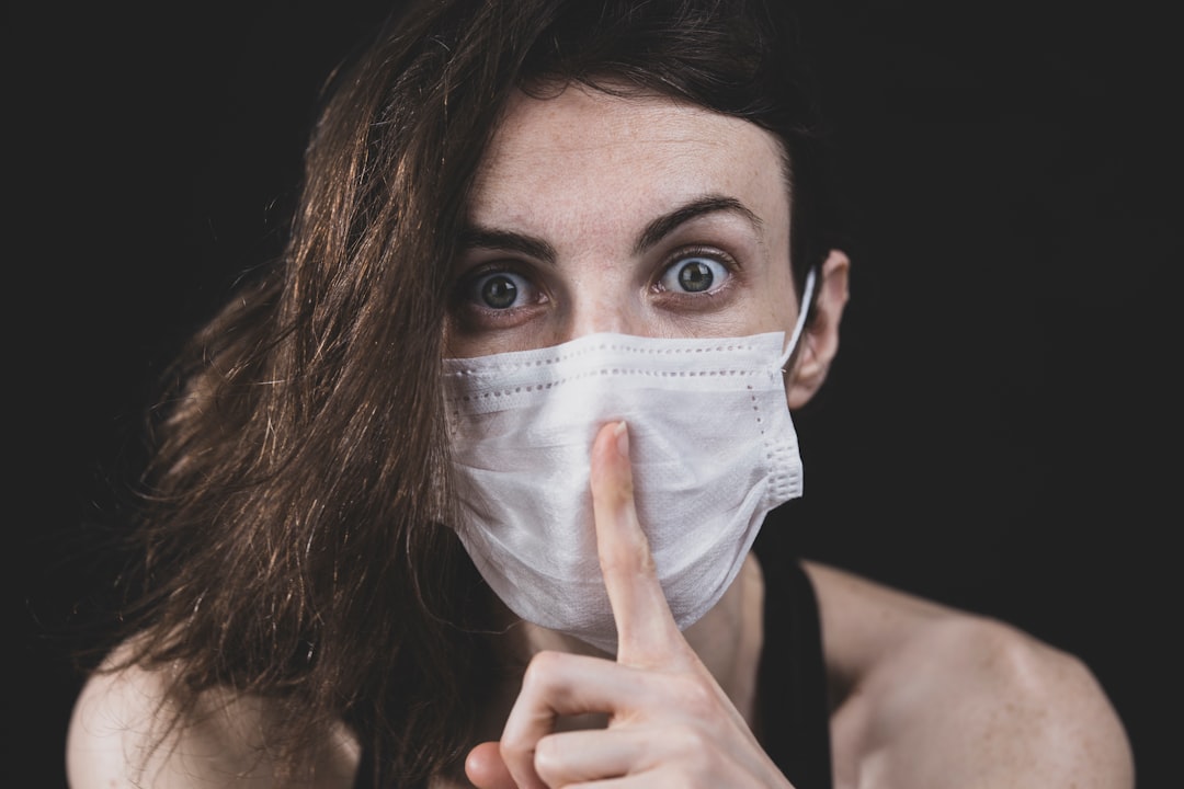 young woman and coronavirus mask