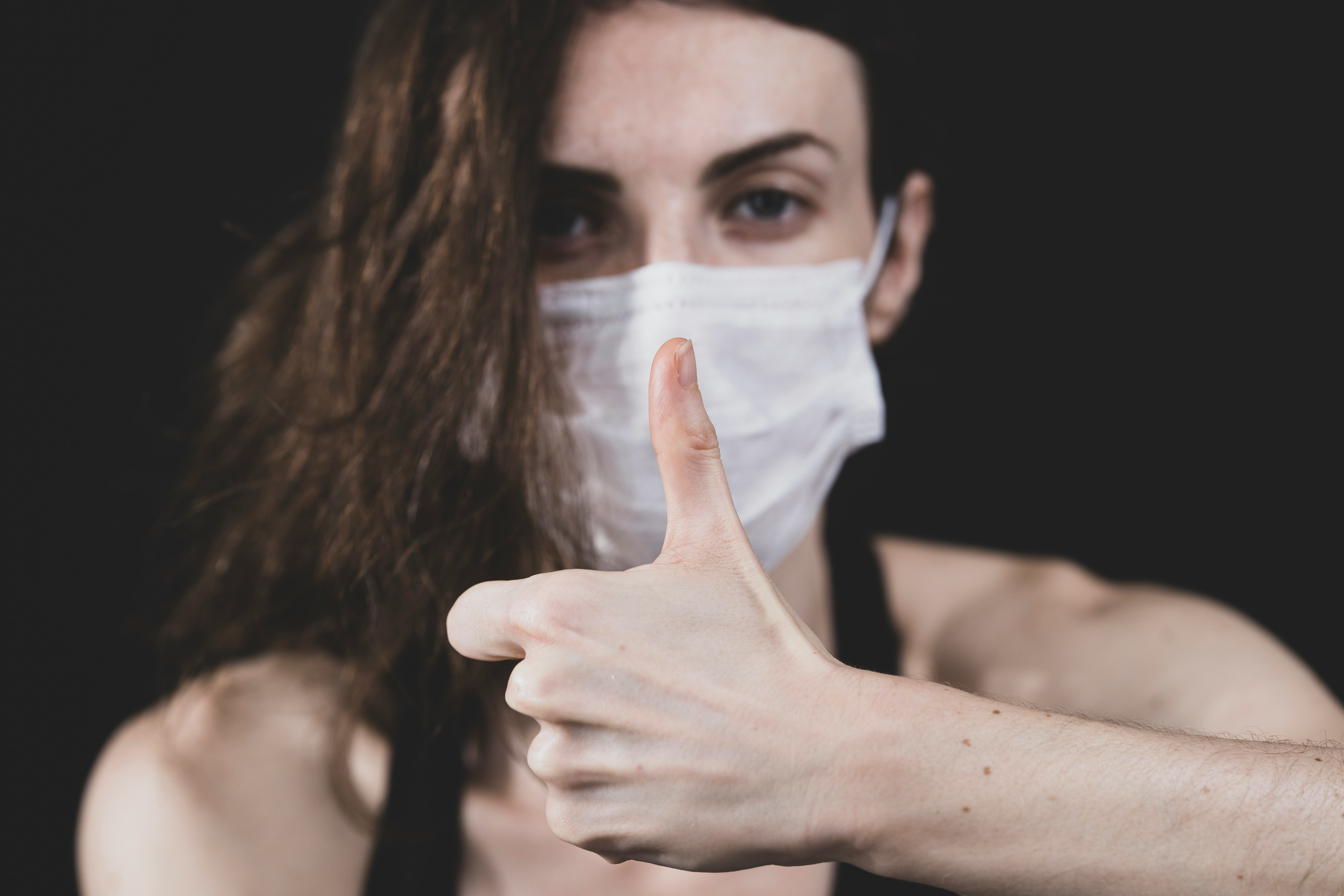 young woman and coronavirus mask