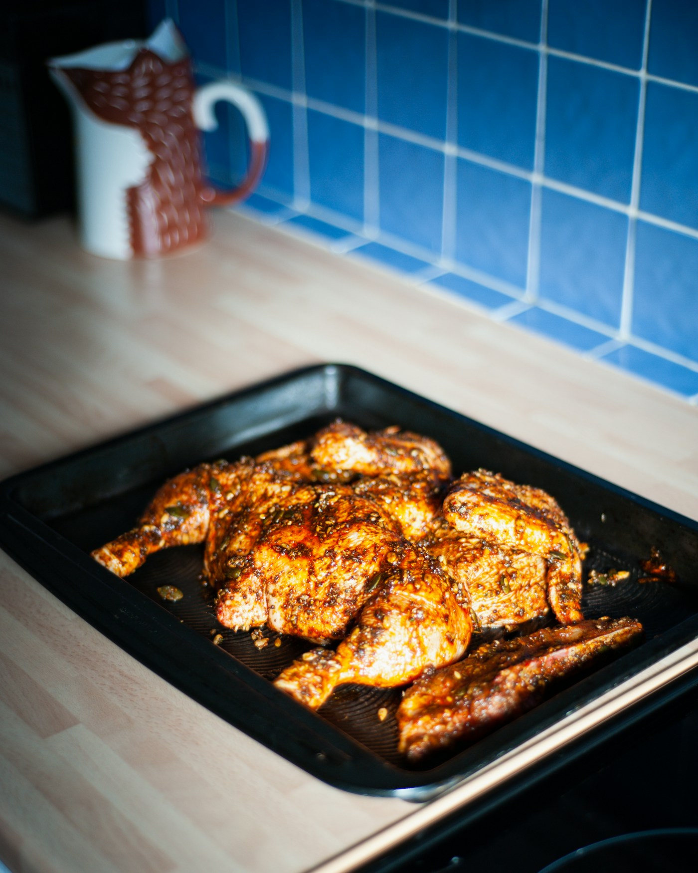 Sheet pan chicken thighs with roasted vegetables fresh from the oven