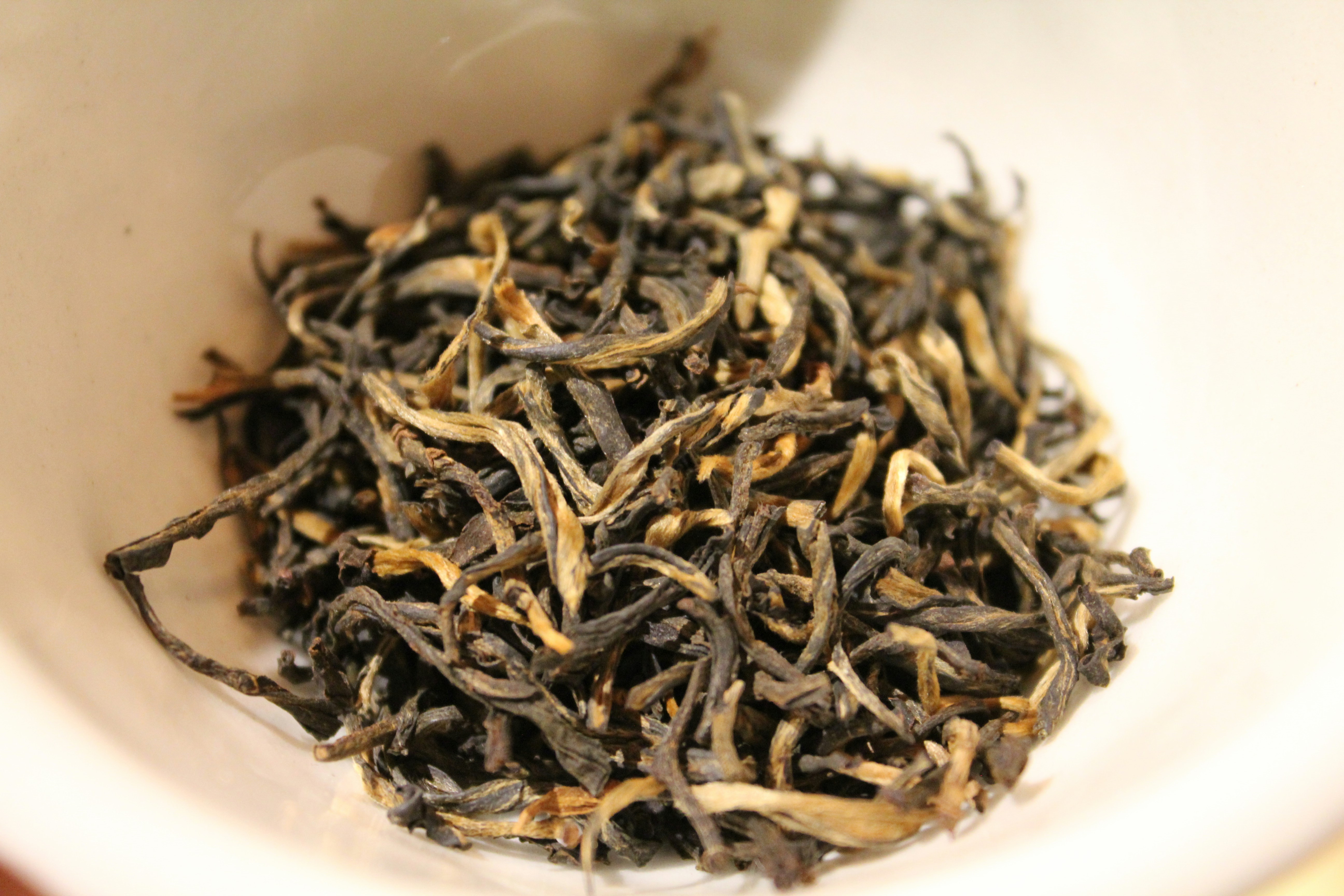Assam tea leaves in a bowl