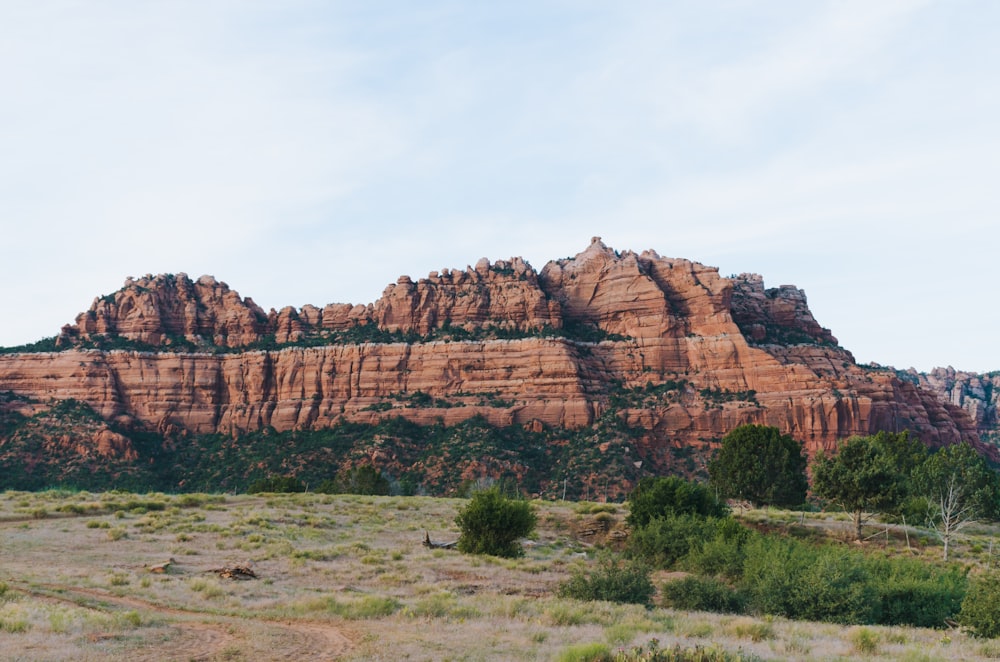 brown rock formation under blue sky during daytime