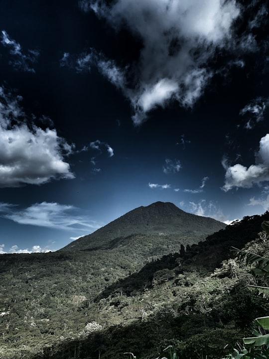 green mountain under blue sky during daytime in Volcán San Pedro Guatemala