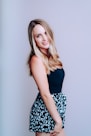 woman in black tank top and white and black floral skirt