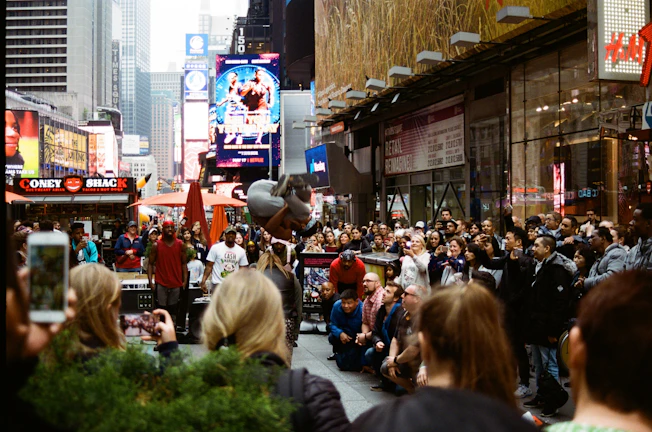A vibrant thumbnail showing a lively street performance.