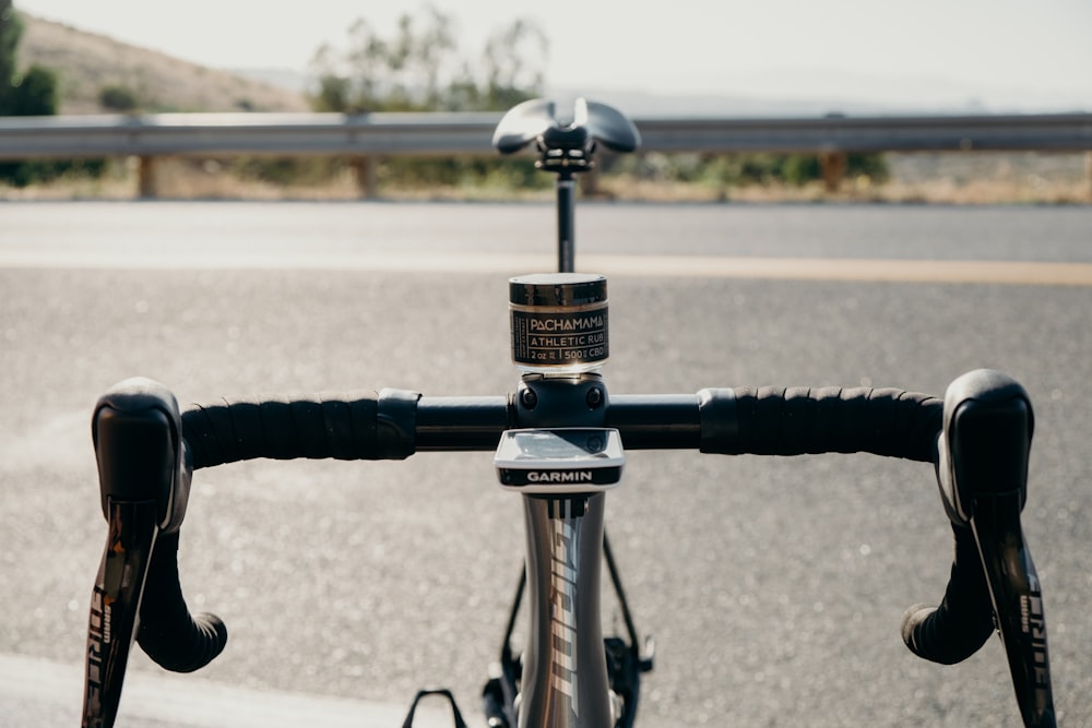 black and silver bicycle handle bar