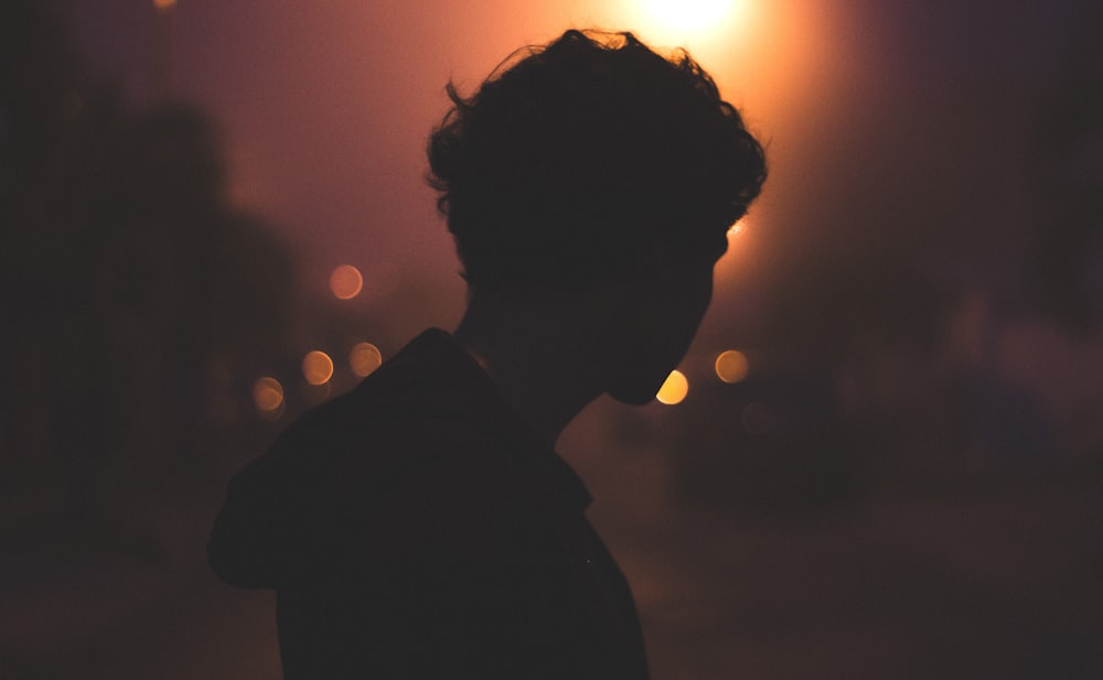 silhouette of man during sunset