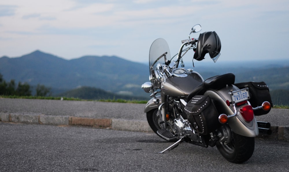 black and silver cruiser motorcycle on road during daytime