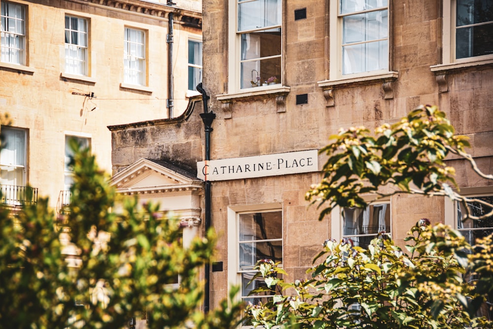 a building with a street sign in front of it