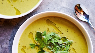 green soup on white ceramic bowl