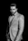 man in suit jacket grayscale photo