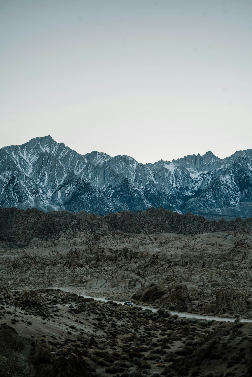 gray rocky mountain under white sky during daytime