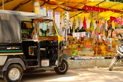 black auto rickshaw on road during daytime