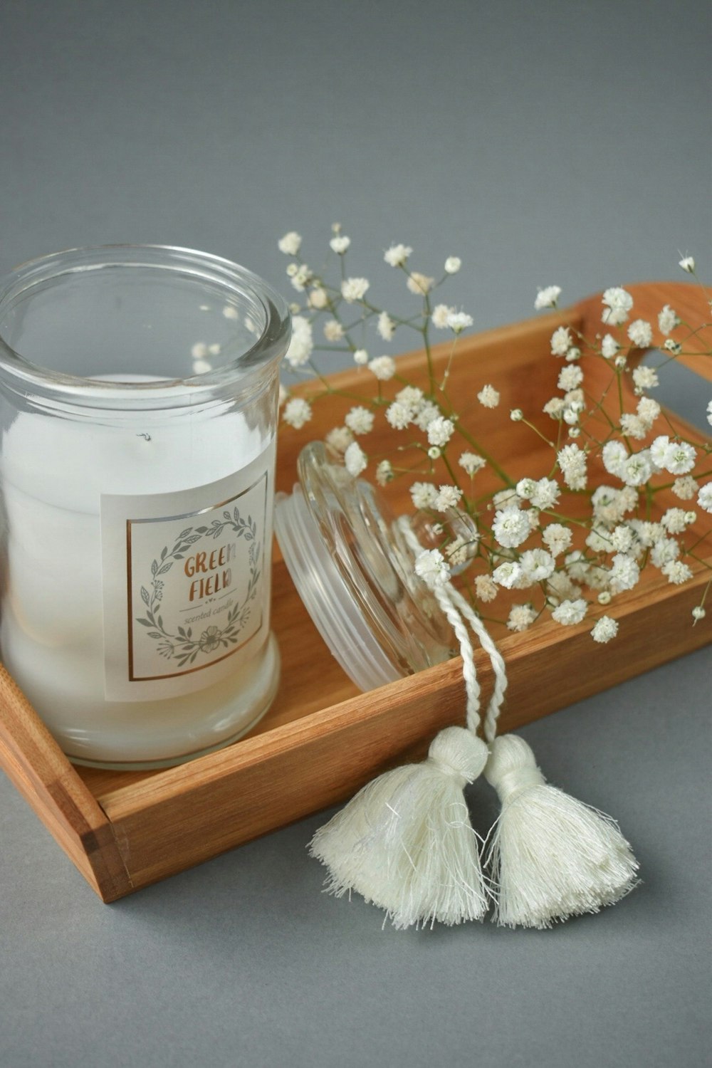 white plastic jar on brown wooden table