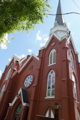 Color photograph of the church's new brick sanctuary completed in 1955 with stained glass windows.