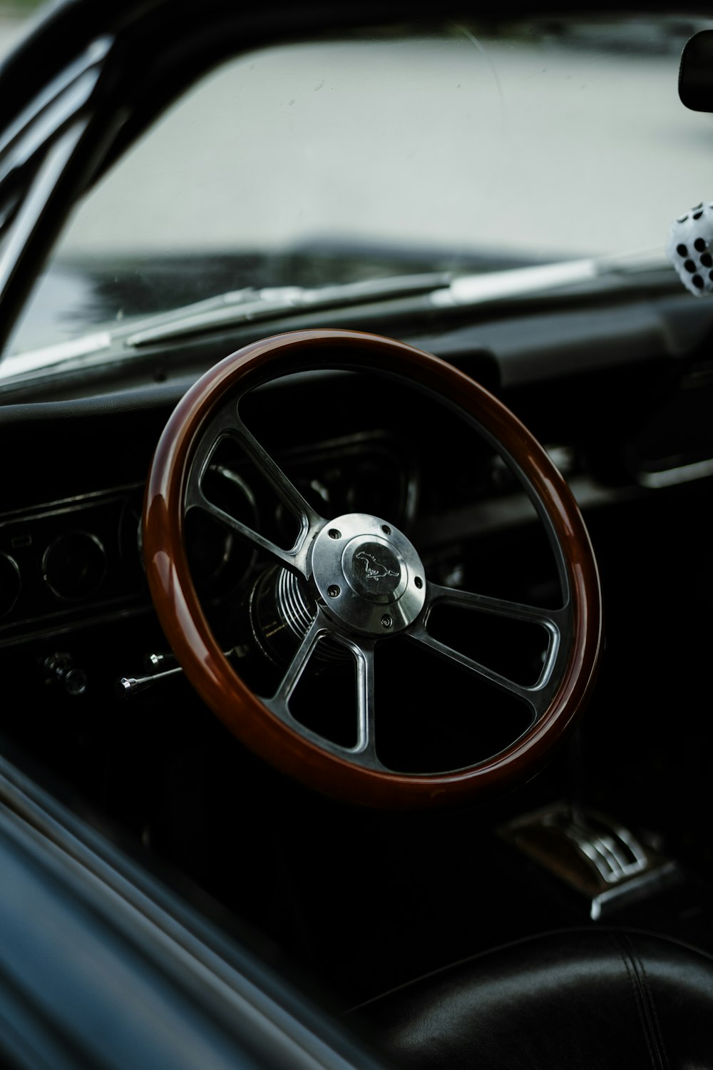 red and silver car steering wheel