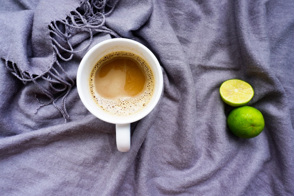 white ceramic mug with coffee