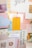 A collage of various inspirational and decorative pieces, featuring a central yellow card that reads 'YOU ARE MY SUNSHINE' surrounded by other cards with positive quotes and pastel colors. The arrangement includes elements like floral patterns, calligraphy, and soft textures, pinned to a board.