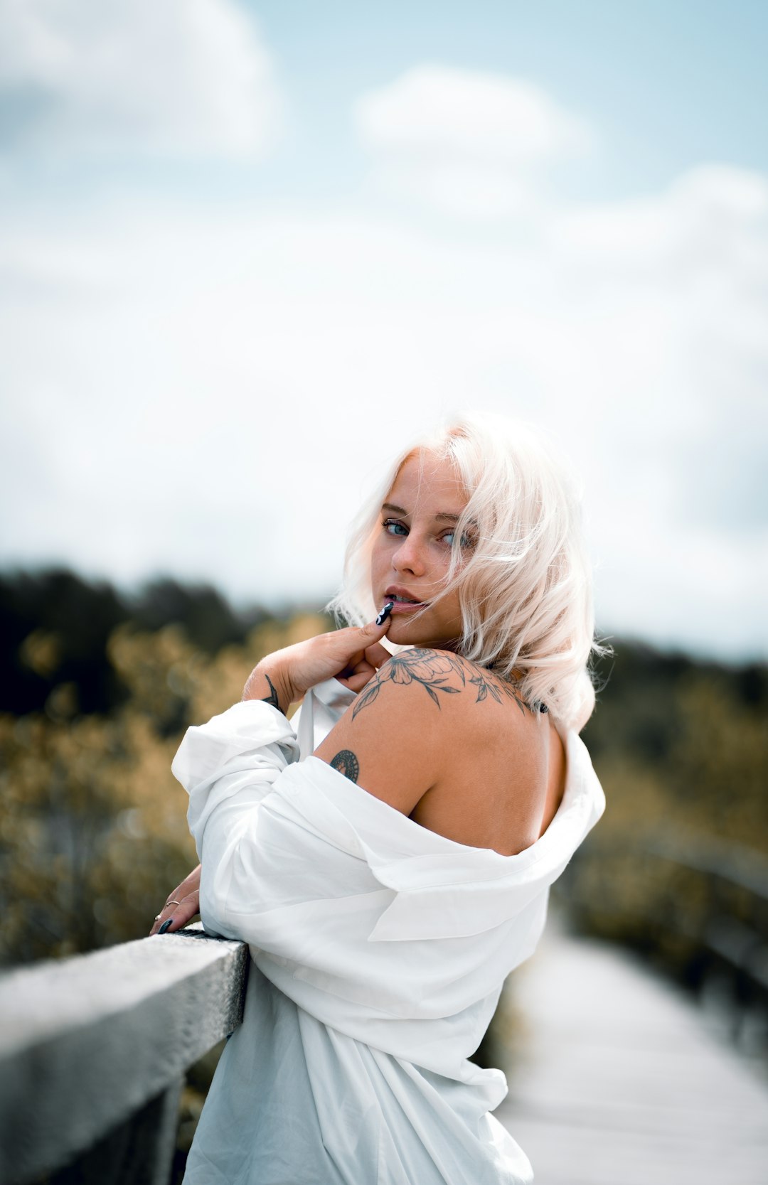 woman in white long sleeve shirt