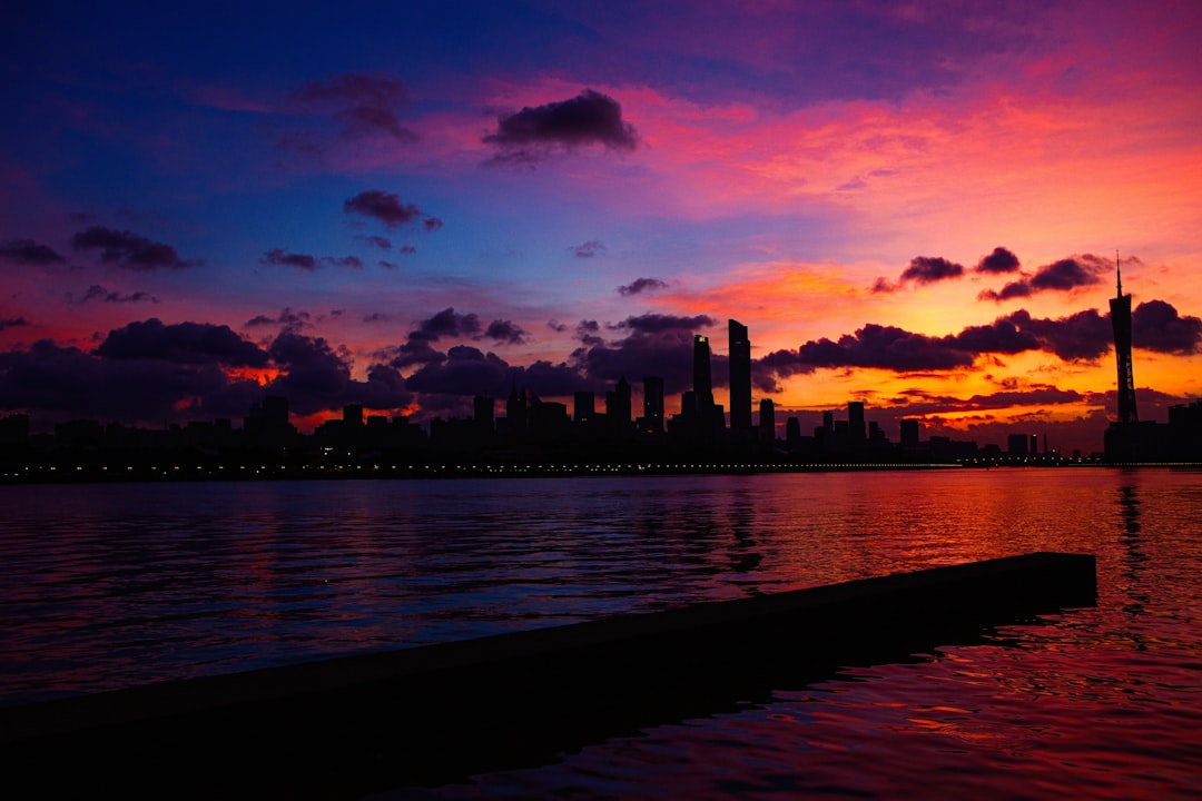 silhouette of city skyline during sunset