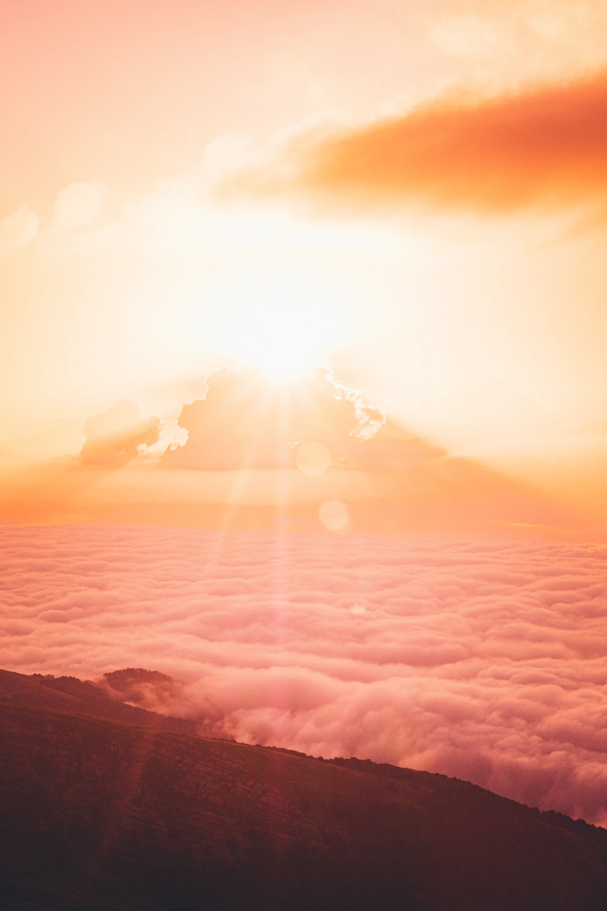 Sunlight breaking through clouds, symbolic of Moksha, spiritual liberation