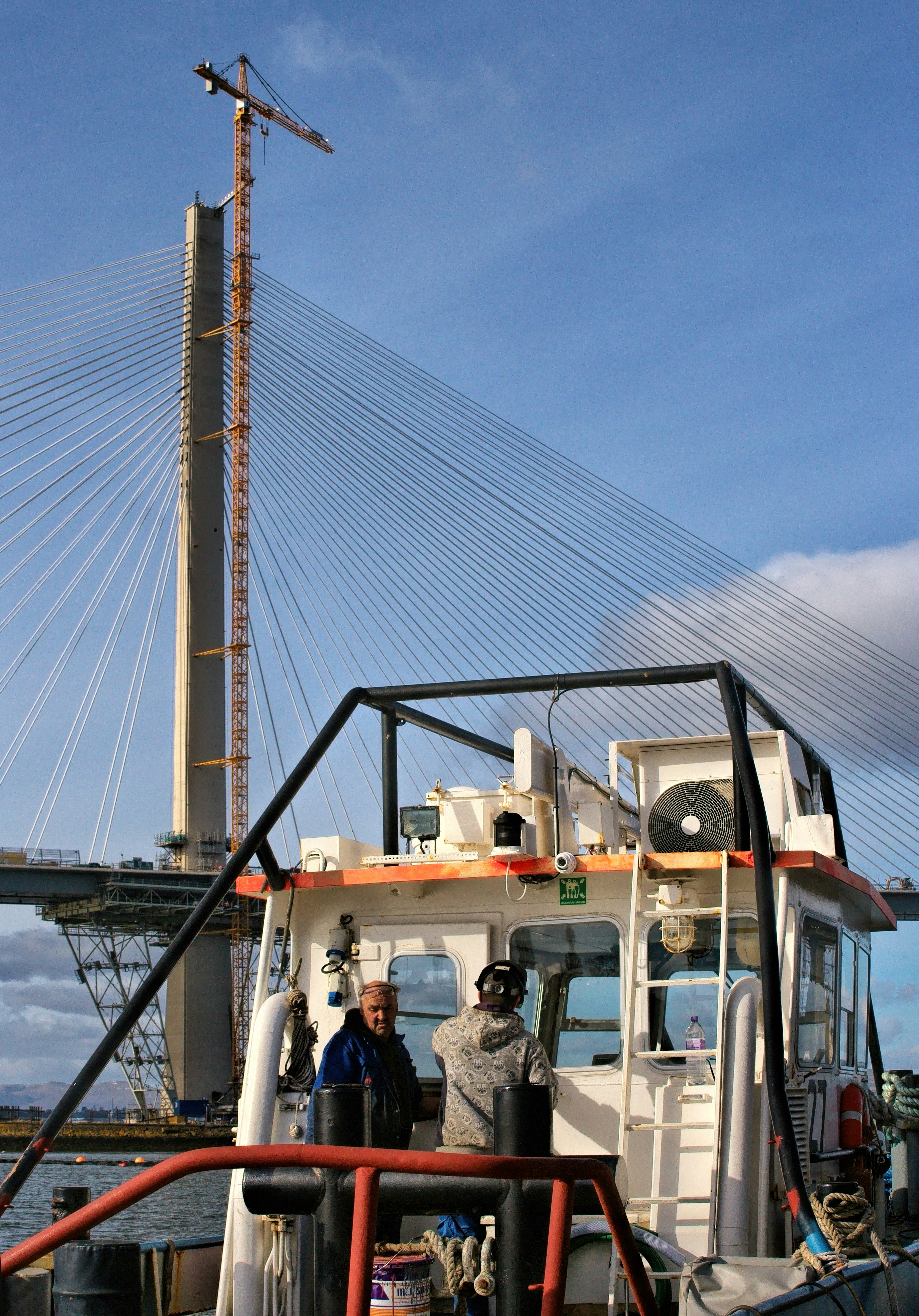 people standing on ship during daytime