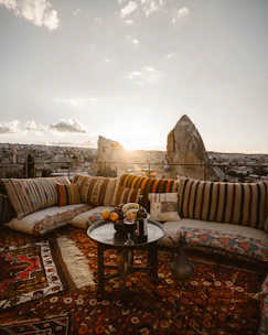 Peaceful outdoor setting with a circle of cushions ready for a small group gathering.