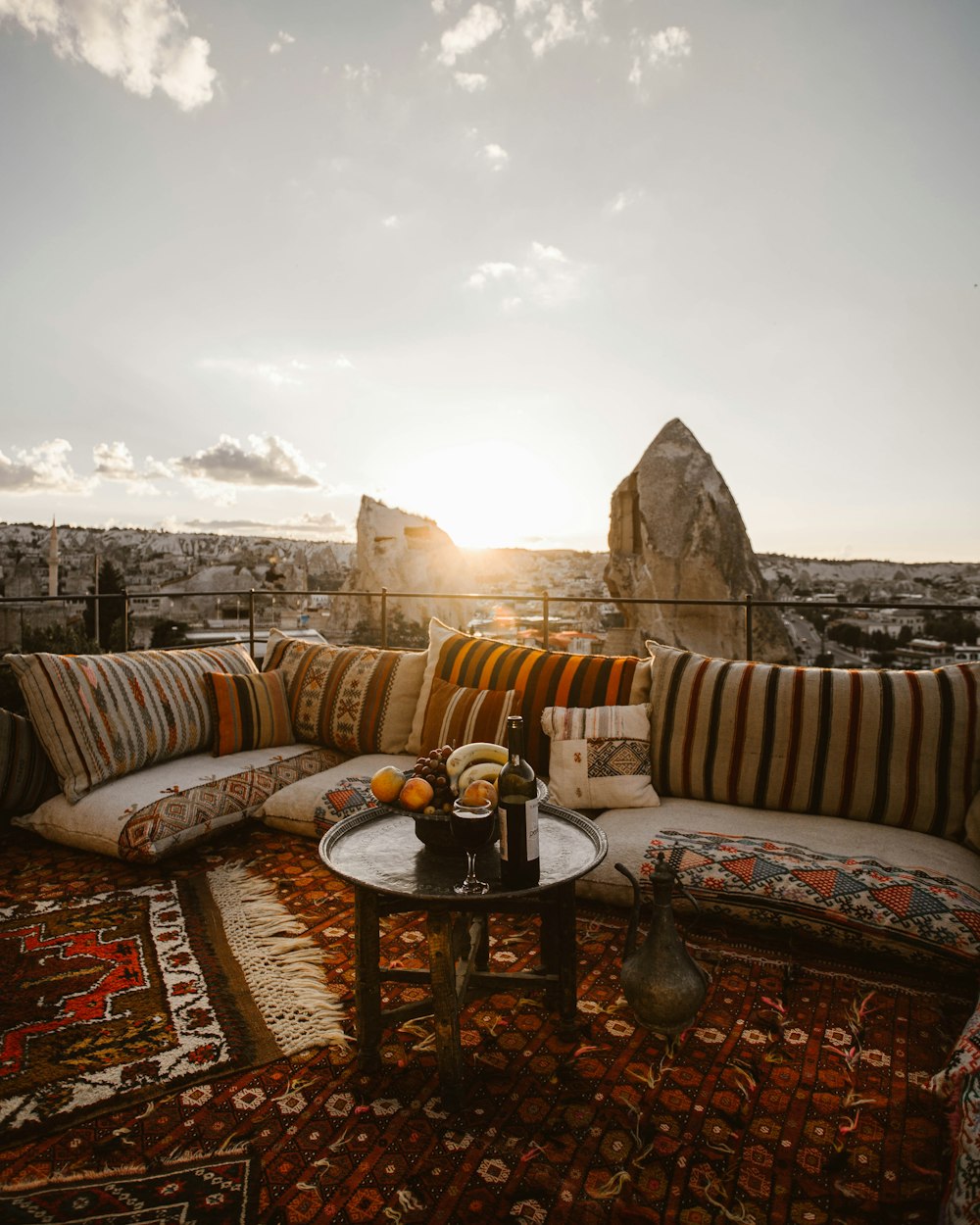 brown wooden round table on brown carpet