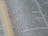 A close-up view of a page from a book, with text printed in two columns. The text is in English and is clearly visible, with some words highlighted through natural focus effects.