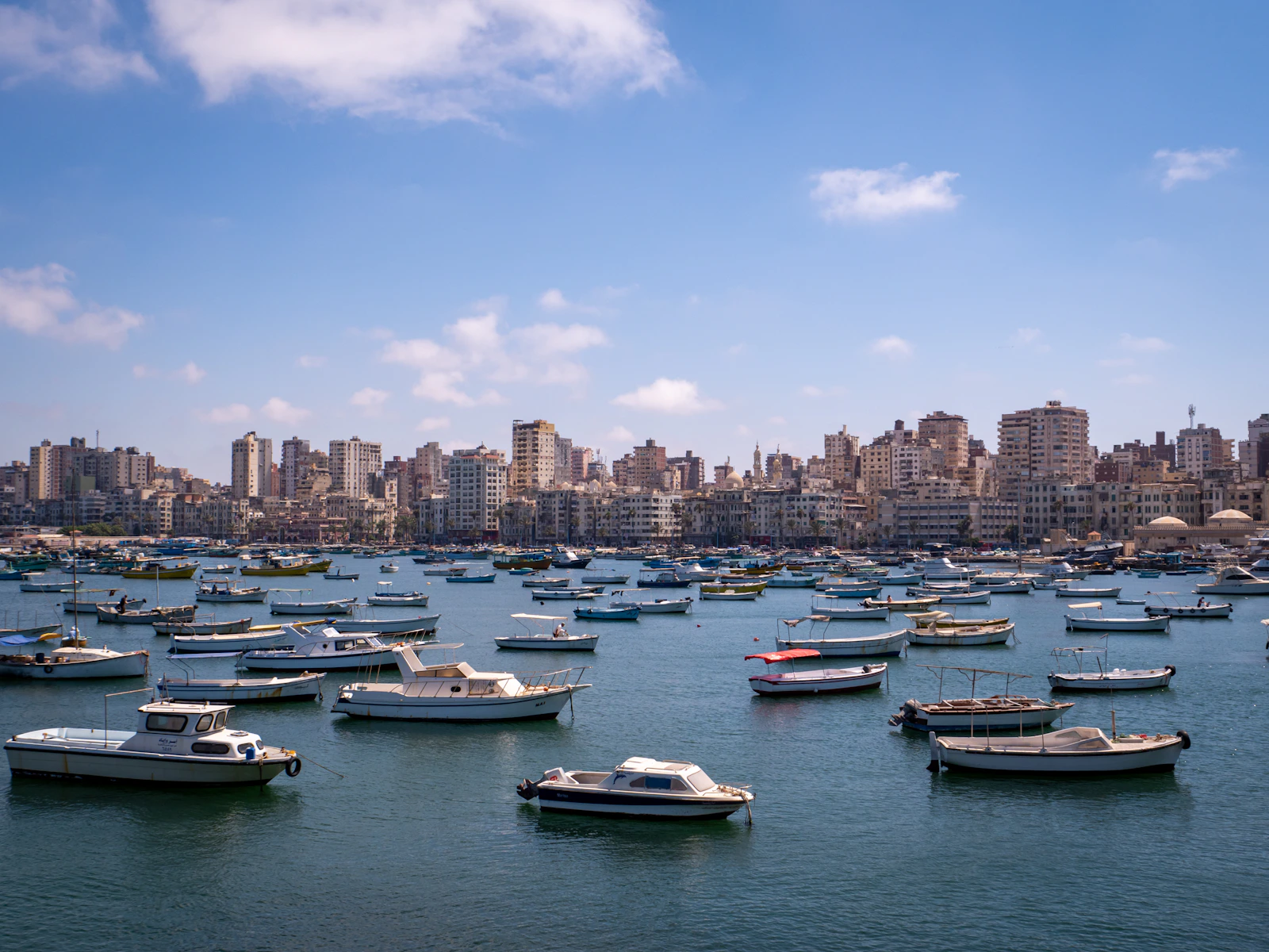 Boats and harbor light on the Mediterranean coast at Alexandria