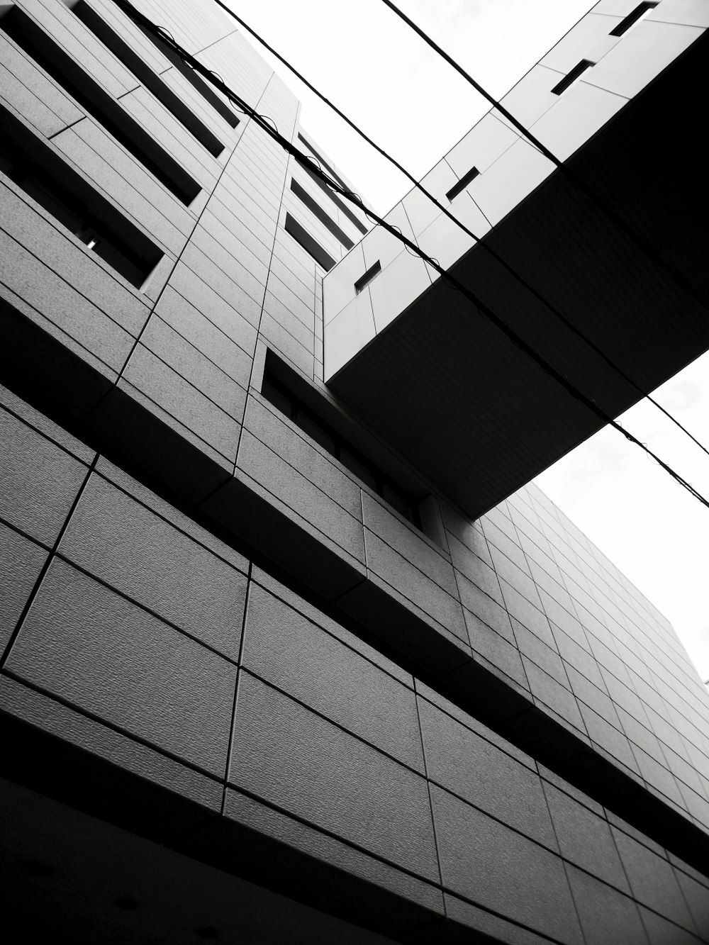 grayscale photo of concrete building