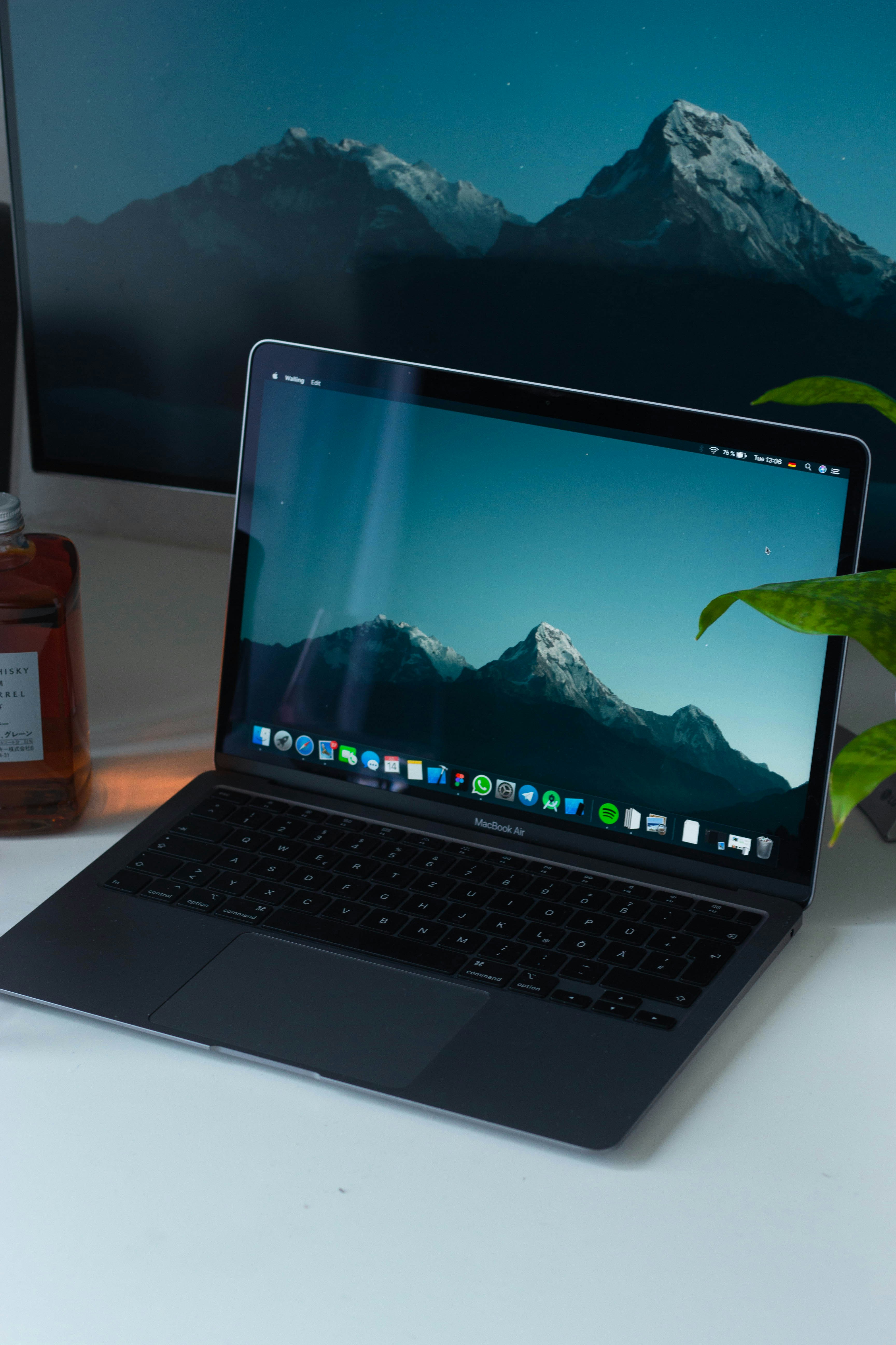 macbook pro on white table