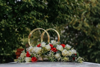 red and white flowers on basket
