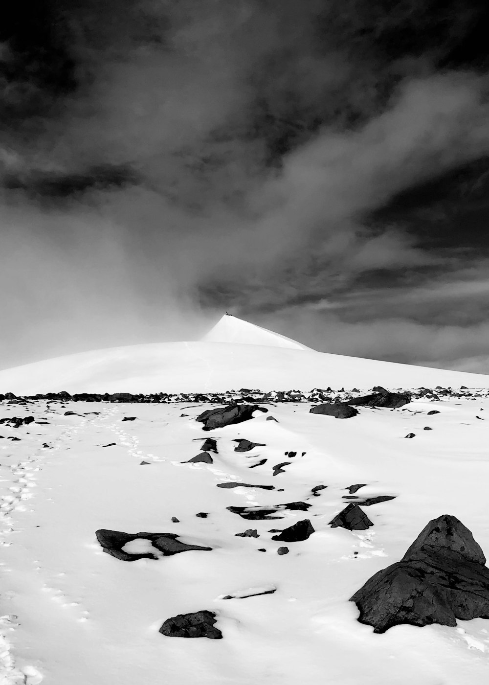 grayscale photo of snow covered mountain