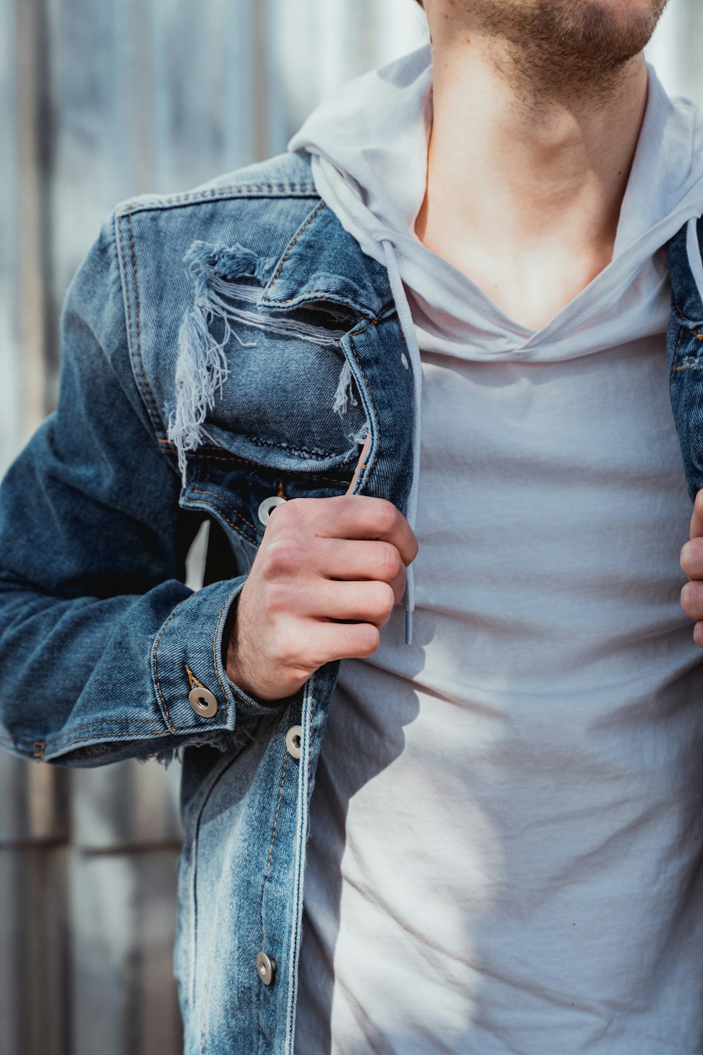 person in blue denim jacket