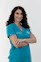 woman in blue crew neck t-shirt smiling
