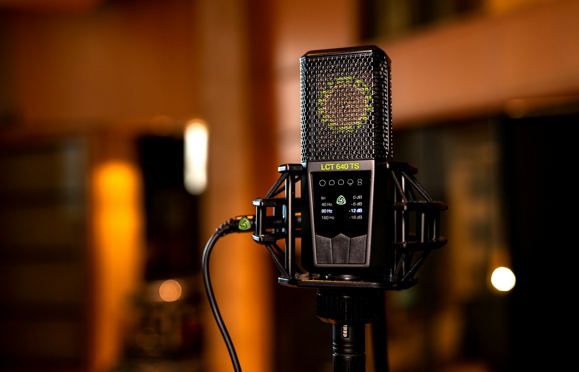 black and silver microphone on black stand