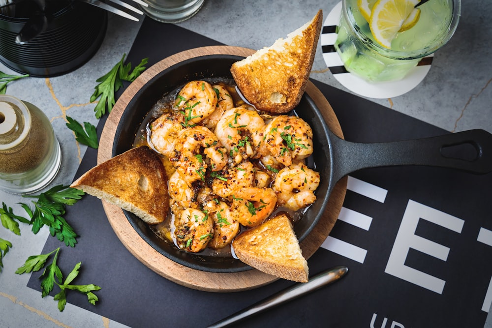 fried food on black round plate