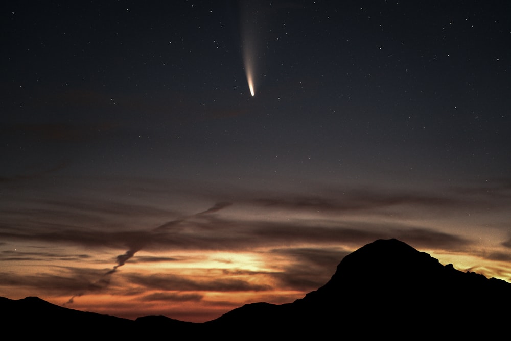 silhouette of mountain during sunset