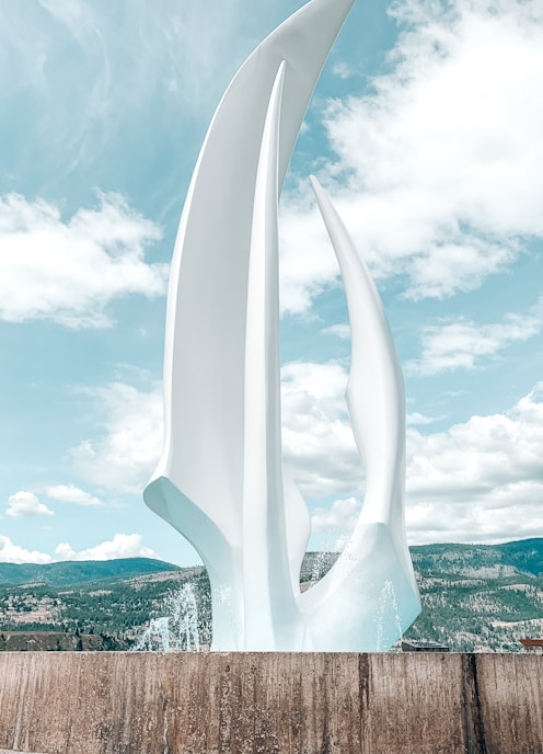 white concrete building under blue sky during daytime