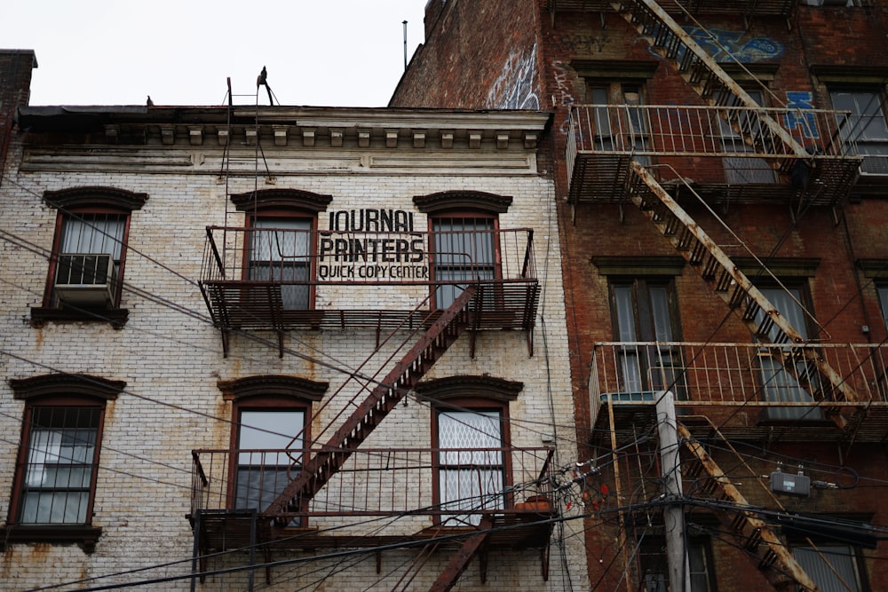 brown brick building with brown wooden window