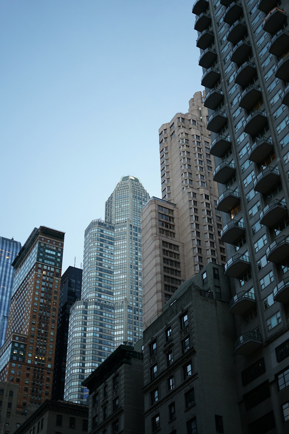 high rise buildings under blue sky during daytime