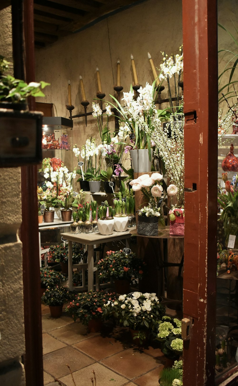 brown wooden table with flowers