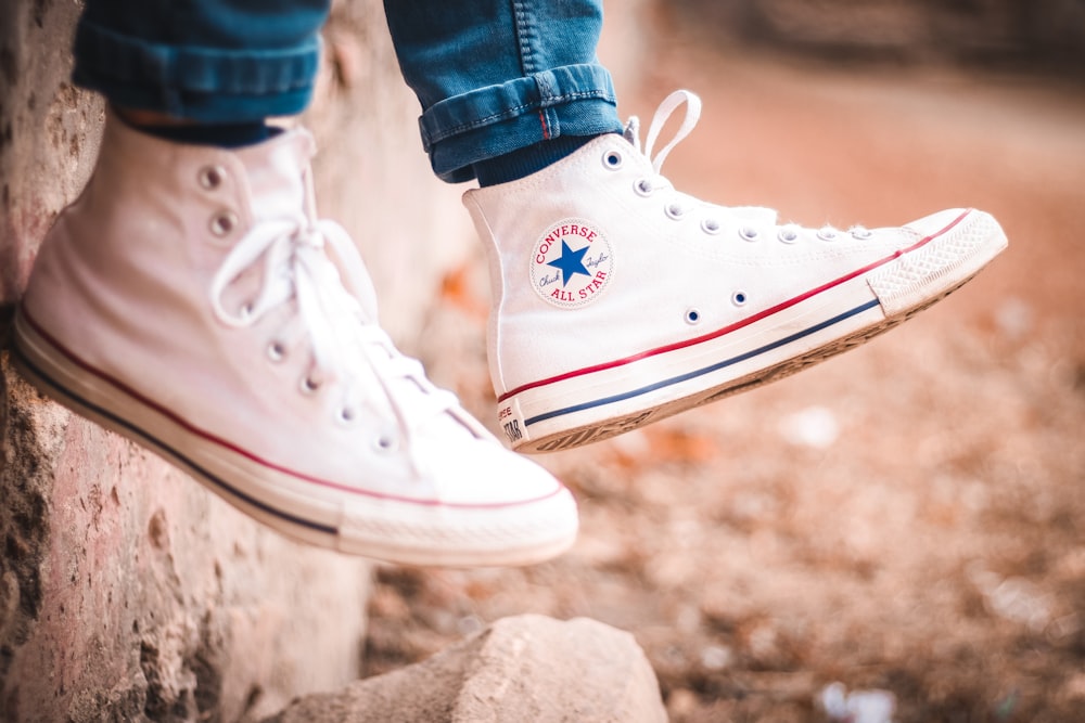 person wearing black converse all star high top sneakers photo – Free  Converse Image on Unsplash
