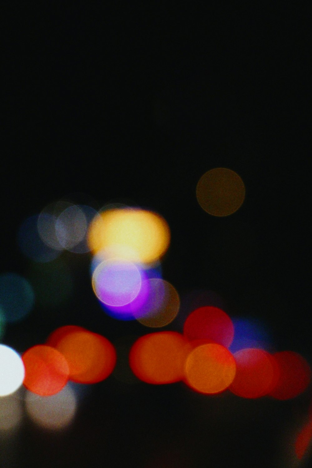 red yellow and blue bokeh lights