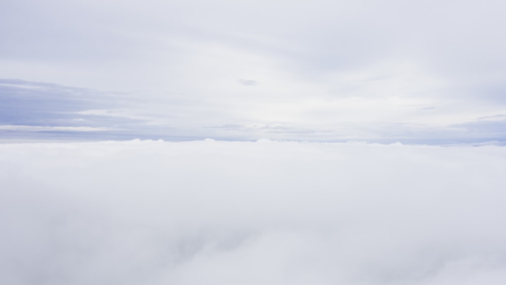 white clouds over the mountains