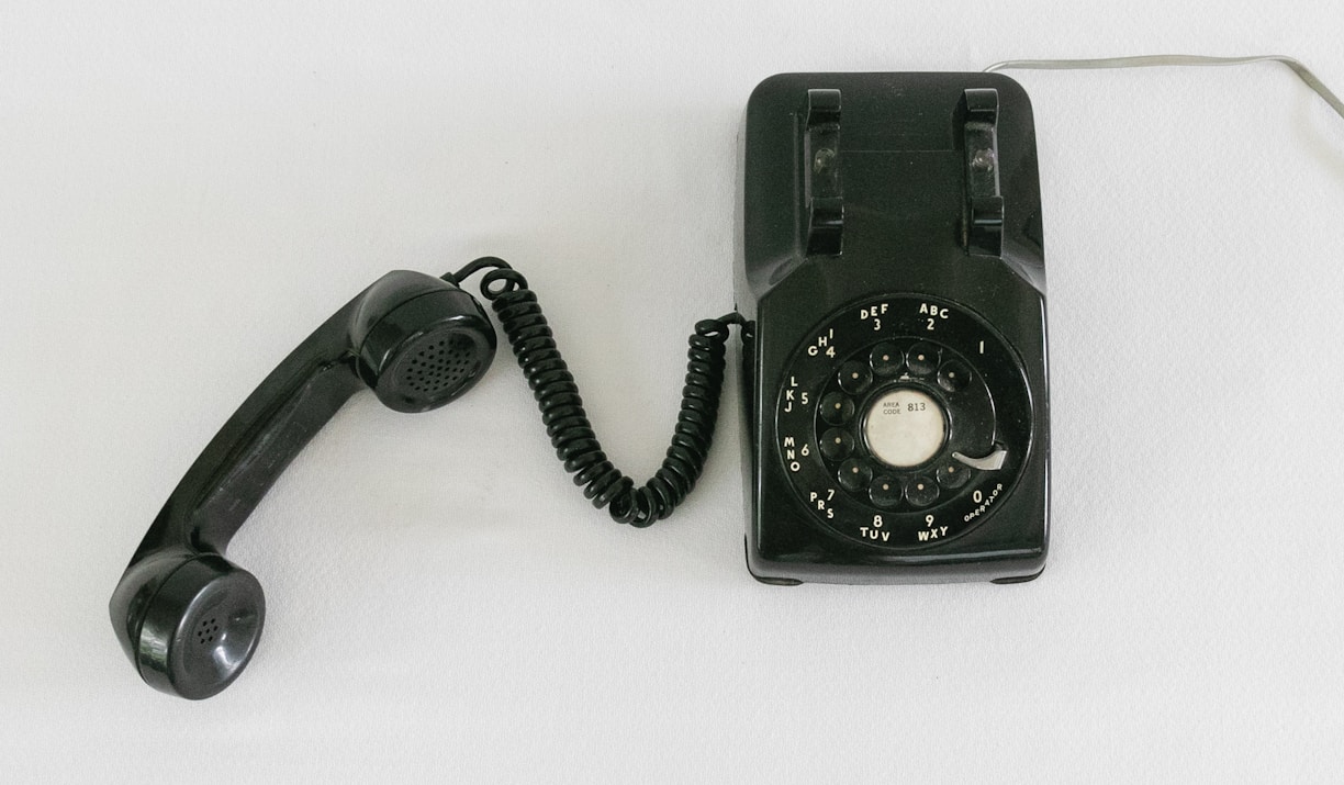 black and silver rotary phone