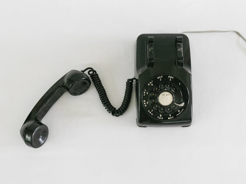 black and silver rotary phone