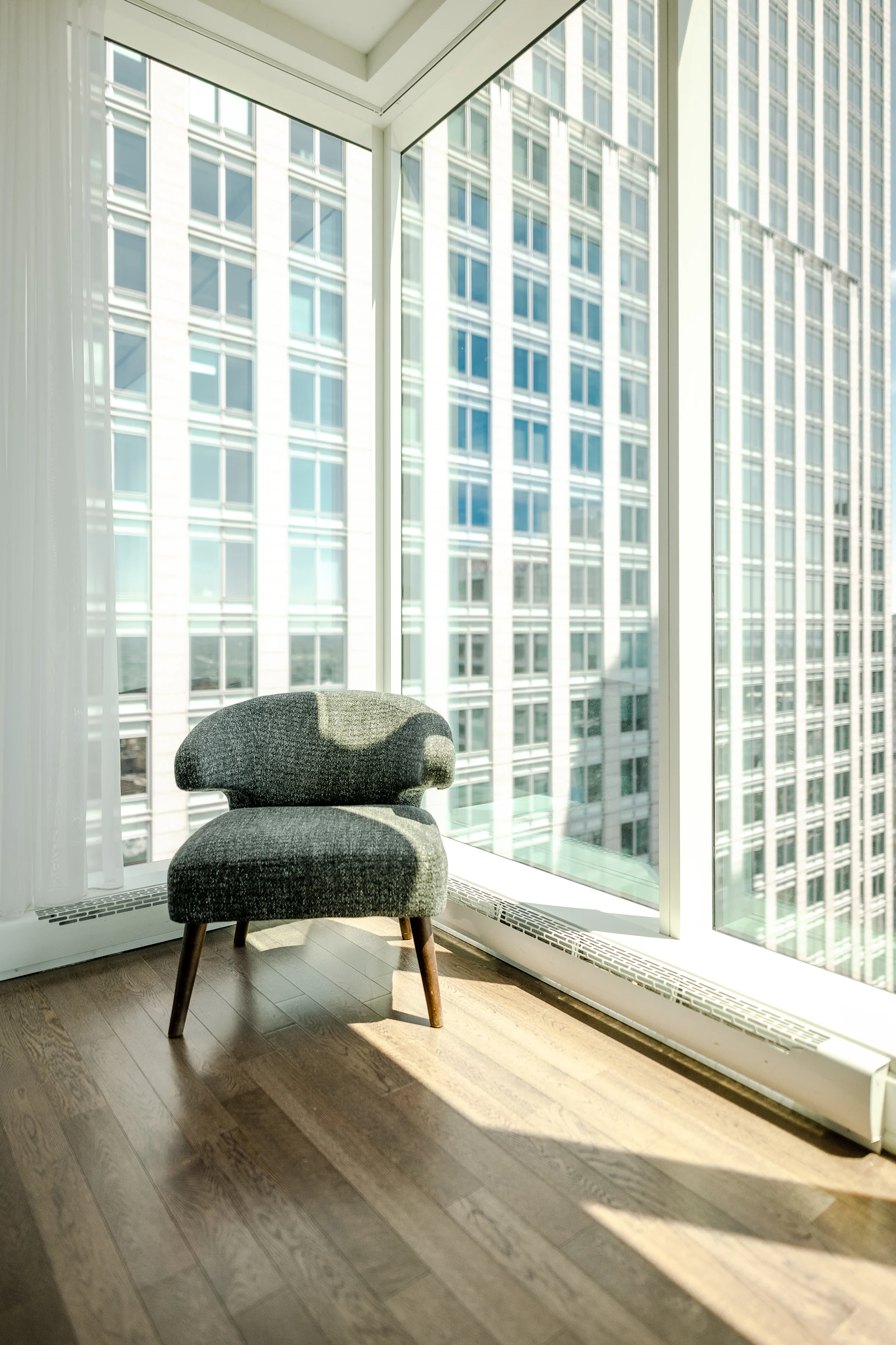 Modern interior featuring fitted window blinds